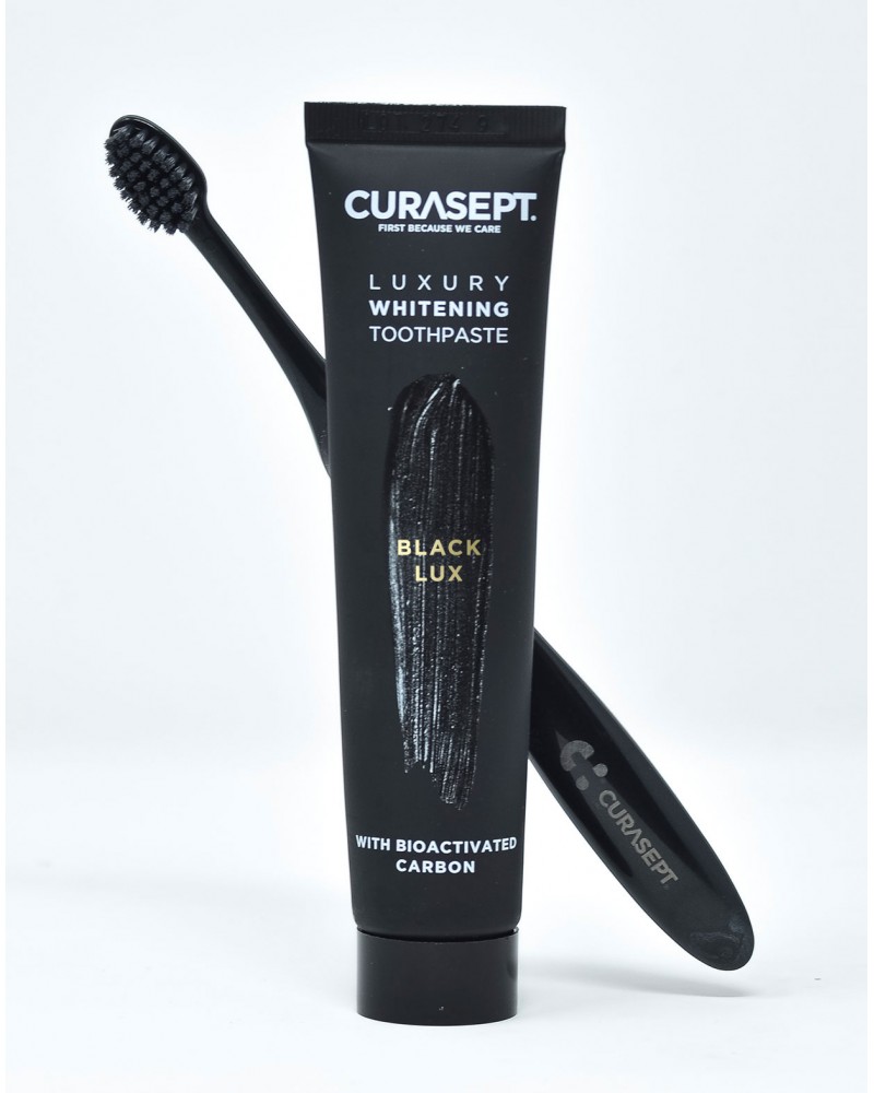 CURADENT DENTIFRICIO EXTREME WHITE SBIANCANTE AL CARBONE 75 ML - Farmavicinoate